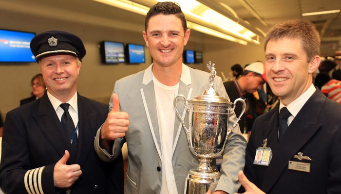 Orlando Airport, Jun 30: British Airways pilot Captain Greig Law and First Officer Francis Gray, greet US Open Champion Justin Rose and the US Open Trophy at Orlando Airport as they prepare to fly them to the UK in advance of the Open Championship (British Open).